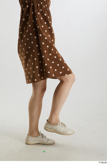 Aera  1 brown dots dress casual dressed flexing leg…